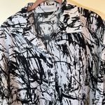 John Mark  White Black Abstract Top Medium Photo 1