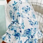 MALIBU MOMENT RUFFLED FLORAL MINI SKIRT (MALIBU BLUE) BOUTIQUE Size undefined Photo 1