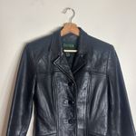 Danier ladies Black soft Leather Jacket with Tailored Silhouette size 4 Photo 1
