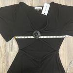 We Wore What NWT  Black Asymmetrical Cutout Dress Short Sleeve Flower Pin Size L Photo 2
