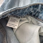 Pistola  Lennon in Distressed Photo 2