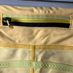 Lululemon RUN PACE CAPRI ATHLETIC LEGGINGS WO SIZE 12 YELLOW BLACK ACCENT Photo 8