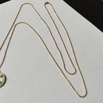 Gold Tone Chain Necklace With Donut Worry Charms Photo 1