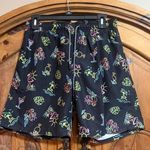 Broken Threads Surf Neon beach shorts with palm trees, flamingos, and cocktails Photo 0