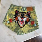 Gucci Washed Studded And Tiger Embroidered Denim Shorts in Green/Yellow Photo 4