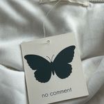 No Comment Chic White Maxi Dress with Brown Floral Design Photo 5