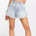Free People  Harlie Denim Shortie in Mirage Fray Blue Flared Denim Shorts Size 28 Photo 1