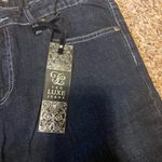 Luxe ❤️ NWT  brand skinny cropped blue jeans with bedazzled pockets Photo 1