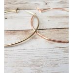 Extra Large Multi Tone Hoop Earrings (One Gold Tone, One Rose Gold Tone) Photo 1
