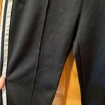 Adidas  track pants white stripes and a slim tapered leg women’s S long Photo 3