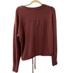 Athleta  Cropped Long-Sleeved Crewneck Drawstring Size Medium Athleisure Active Photo 1