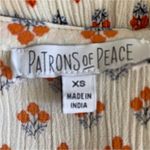 Patrons of Peace  Embroidered Peplum Tank Top Photo 1
