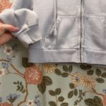 Brandy Melville  Light Blue Zip-Up Hoodie Photo 4