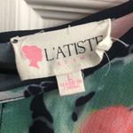 L'ATISTE Navy floral long sleeved romper Photo 1