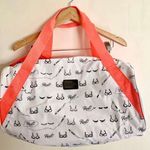 Benefit cosmetics over night duffel bag White Photo 0