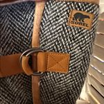 Sorel  Tan and Black Herringbone Buckle Boots Photo 1