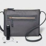 A New Day Crossbody Bag with Portable Charger. Photo 0