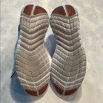 Nike Black Athletic Shoes with orange, blue and purple back Photo 3