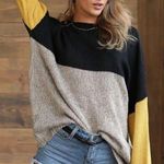 Black and Yellow Crew Neck Sweater with Bold Colorblock Design Size undefined Photo 0