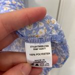 Iris women’s light purple ruffle sleeve button neck loose relaxed floral blouse Photo 3