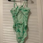 Green one piece swimsuit Size undefined Photo 1