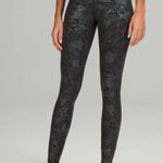 Lululemon ‎ Size 6 Wunder Train High Rise Tight Black Iridescent Foil Full Length Photo 0