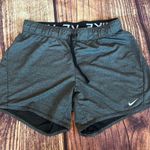 Nike Women’s  Dri-Fit Shorts charcoal Size M Photo 0
