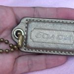 Coach Gold Keychain Tag Photo 0