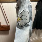 LuLaRoe  Light Wash Blue Denim Jacket with embroidered Eagle on sleeve sz XL Photo 2