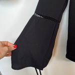 Ro & De XS black flowy blouse with sleeve detail and tie closure Photo 1