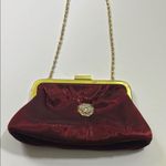 Red and Gold Velvet Clutch with Decorative Clasp Photo 6