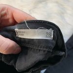 Francesca's Black Knee Slit Skinny Jeans Photo 6