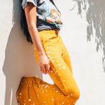 People Of Leisure NWOT Black Paint Splatter Bottom Flare Leggings w/ Slit Flare White Photo 0