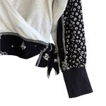 Free People  Auxton Thermal Wrap Top with a floral print Photo 6