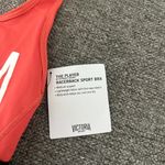 Victoria's Secret The Player by Victoria’s Secret Coral and Black Sports Bra Photo 1