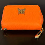 Amazon Orange Leather Wallet with Butterfly Accent Photo 0