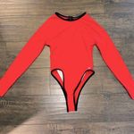 NWOT Swimwear Long Sleeve Open Back One Piece Photo 0