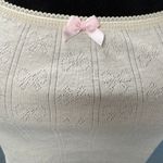 Just Polly cropped white shirt with bow pattern throughout and pink bow‎ Size L Photo 2