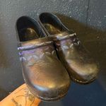 Dansko Women’s  Black Clogs with Purple Embroidered Detail Photo 0