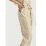 Billabong sandy shores gold floral jumpsuit with pockets Photo 2