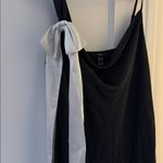 Forever 21  black satin dress with a white bow accent Photo 4