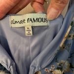 Almost Famous blue body fitting ruched floral strappy dress. Photo 2