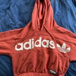Adidas Women’s size Small Orange Cropped Hoodie Photo 0