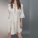 Storia  mini dress tie front bows beige airy flax ditsy floral block print tiered Photo 4