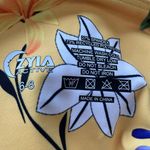 Zyia  reflective Light n Tight leggings Yellow floral print Mesh detail Size 6-8 Photo 8