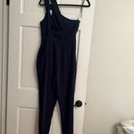 Adelyn Rae  Midnight Blue One-Shoulder Jumpsuit Photo 2