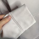 Under Armour loose fit fleece lined hoodie with plush logo pale pink and white L Photo 10