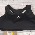 Jordan  black sports bra size small Photo 0