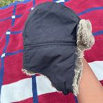 Helly Hansen  bear fur ear flap black faux fur winter trapper hat furry warm Photo 1
