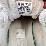 Puma  Carina 2.0 Laser Cut Flowers Sneakers White Gold Logos Athletic Feminine 7 Photo 9